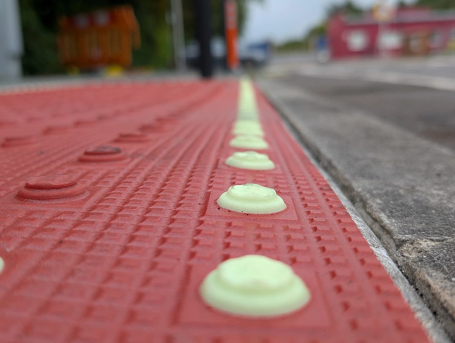 Close up of tactile paving with photoluminescent elements