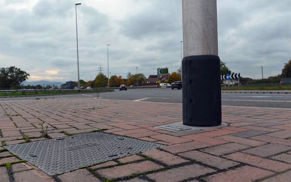 an access chamber with an aluminium post in background